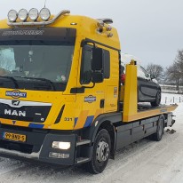 Bergingswagen in de sneeuw